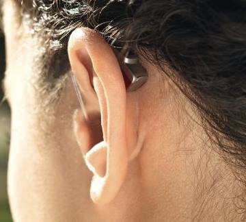 Aide auditive: Écouteur déporté